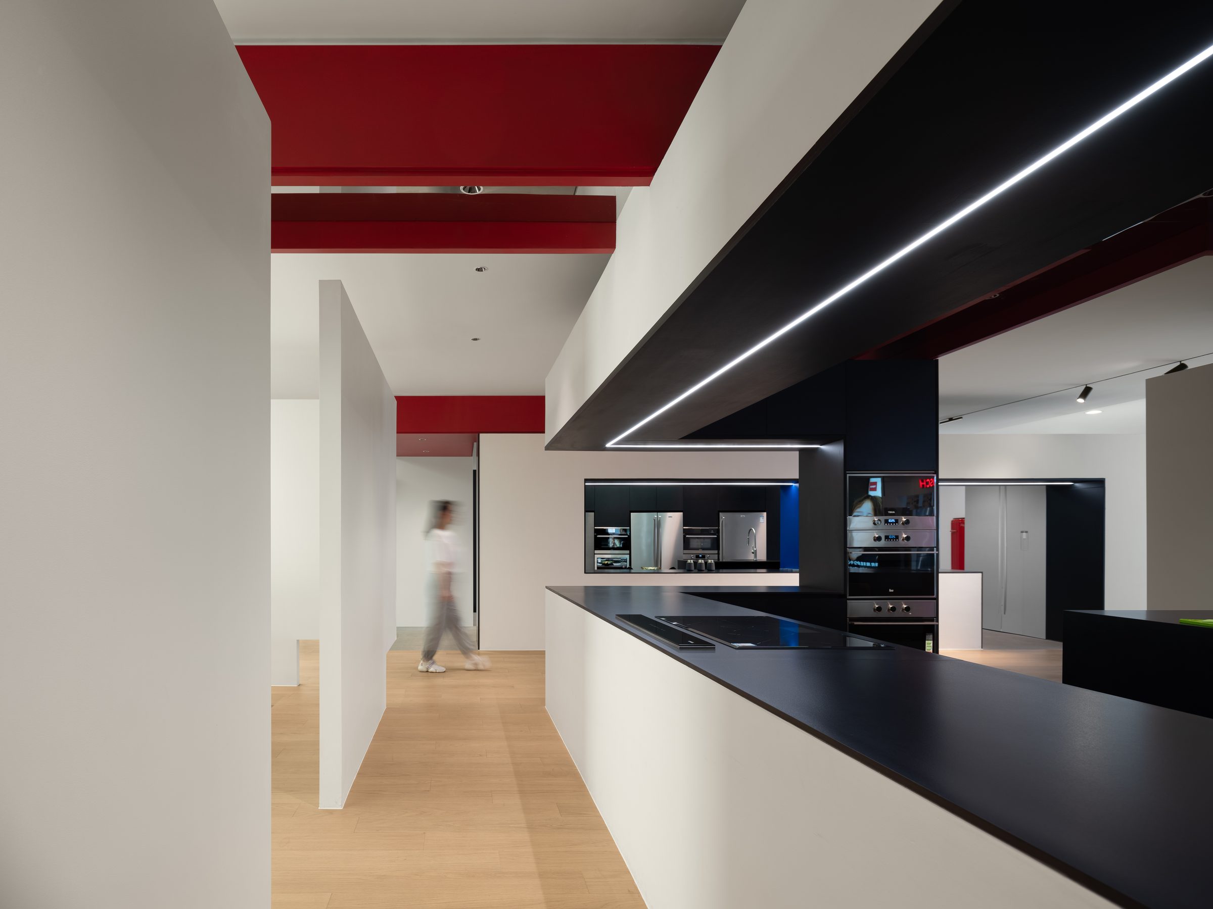 Red line kitchen in a through-plan apartment, Shanghai